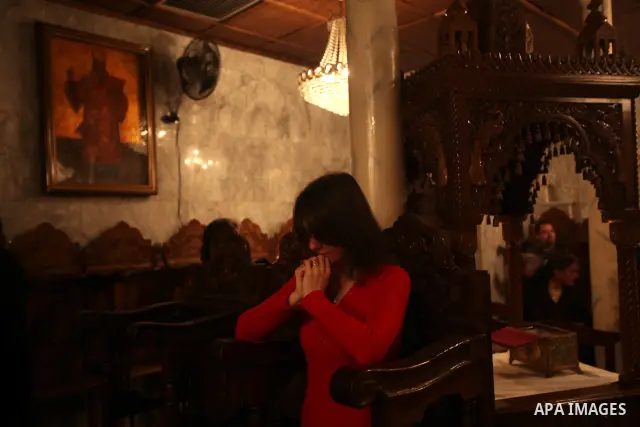 Palestinian Christians pray on Christmas day in the Saint Porfirios church in Gaza City December 25, 2011. Photo by Ashraf Amra