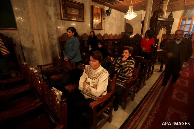 Palestinian Christians pray on Christmas day in the Saint Porfirios church in Gaza City December 25, 2011. Photo by Ashraf Amra