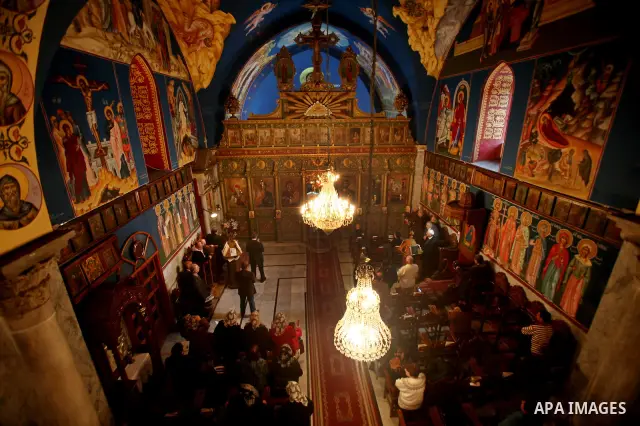 Palestinian Christians pray on Christmas day in the Saint Porfirios church in Gaza City December 25, 2011. Photo by Ashraf Amra
