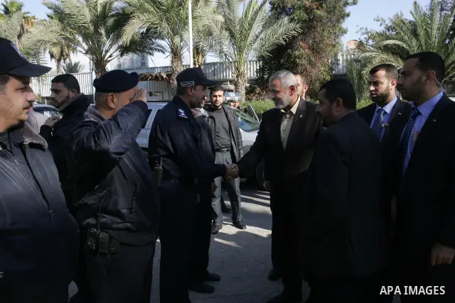 Palestinian Prime Minister in Gaza Strip, Ismail Haniya, arrived to the Rafah border crossing in the southern Gaza Strip on Dec 25, 2011. Haniya will go in foreign tour to participate in an international conference for J...