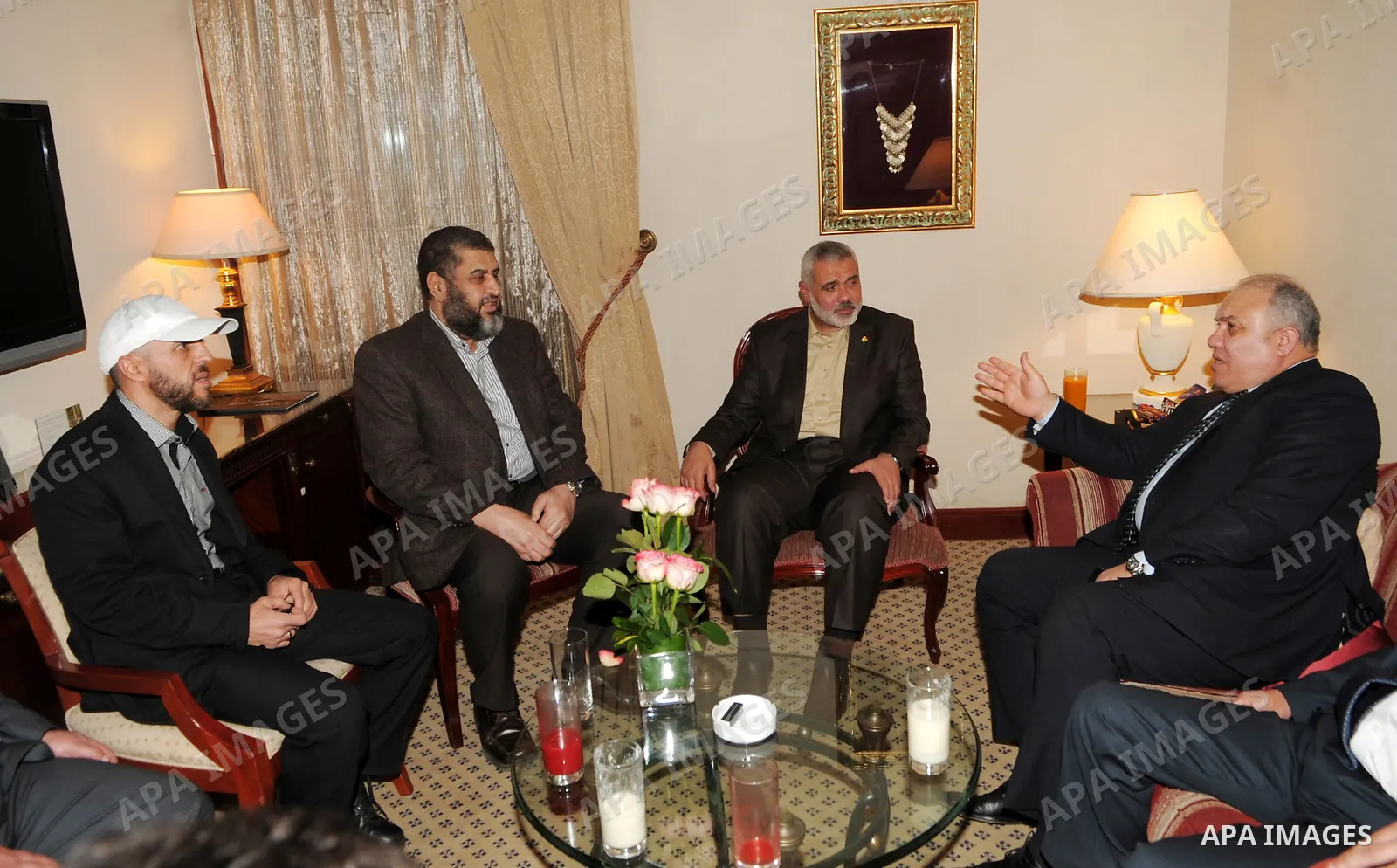 A handout picture released by the press office of Hamas shows Palestinian Hamas premier of Gaza Ismail Haniya, meeting with Khayrat al-Shater, a senior member of Egypt's Muslim Brotherhood, in Cairo on December 25, 2011....