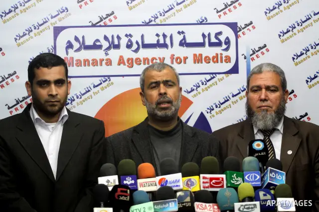 Members of the Palestinian Free Movement delivers speech during a press conference in Gaza city on Dec. 26, 2011. Photo by Mohammed Asad
