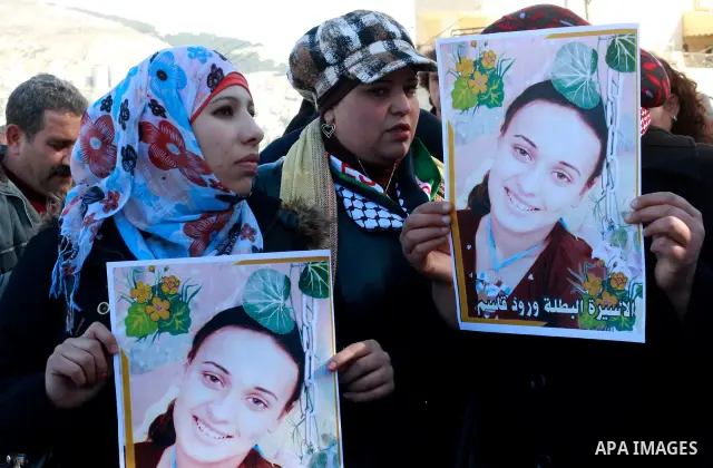 Palestinians participate in a demonstration in solidarity with prisoners jailed in Israel, in the West Bank city of Nablus, Wednesday ,Dec. 28, 2011. Photo by Wagdi Eshtayah.