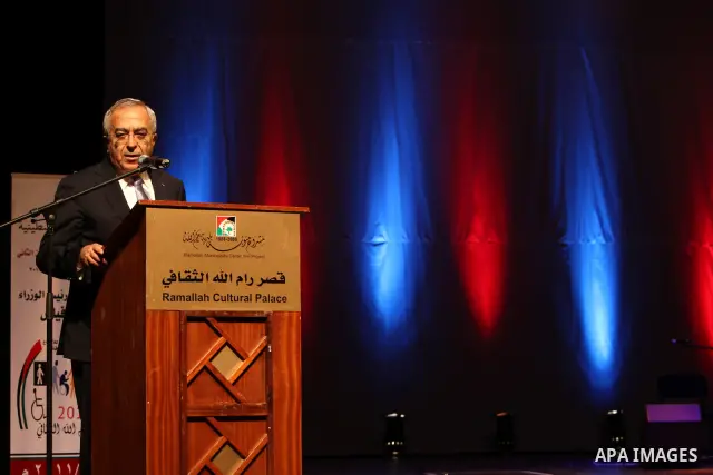 Palestinian Prime Minister, Salam Fayyad, during speech at the opening of the second Palestine Festival of creativity for people with disabilities, in the West Bank city of Ramallah, on Dec. 28, 2011. Photo by Mustafa Ab...