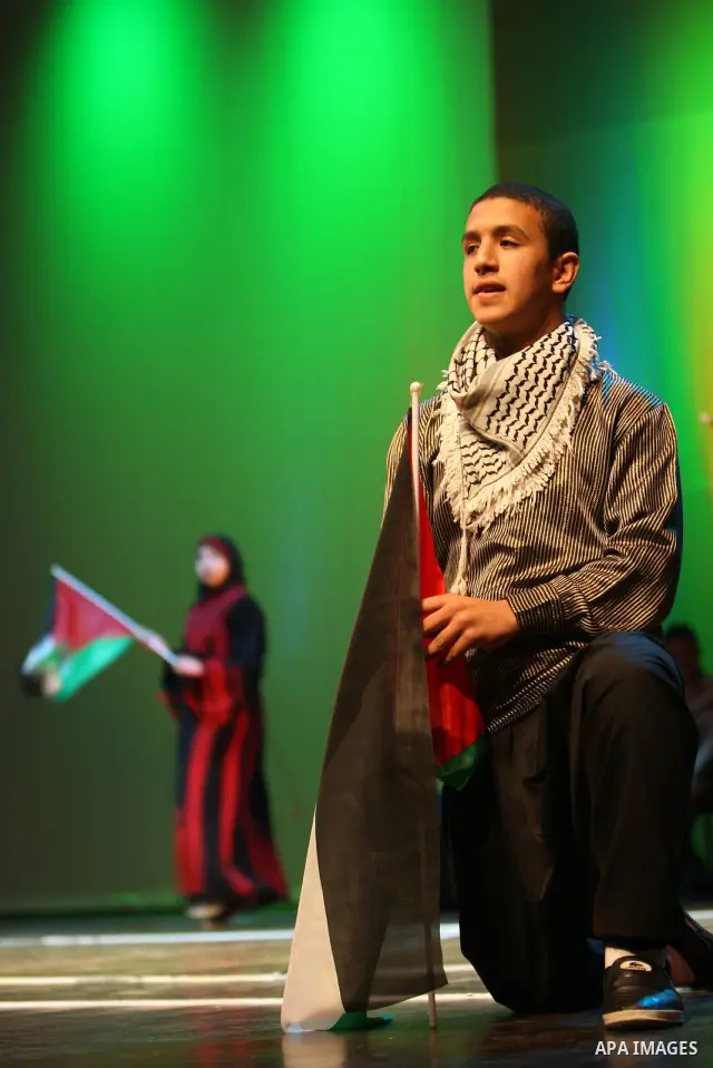 Palestinians disabled during opening of the second Palestine Festival of creativity for people with disabilities, in the West Bank city of Ramallah, on Dec. 28, 2011. Photo by Mustafa Abu Dayeh