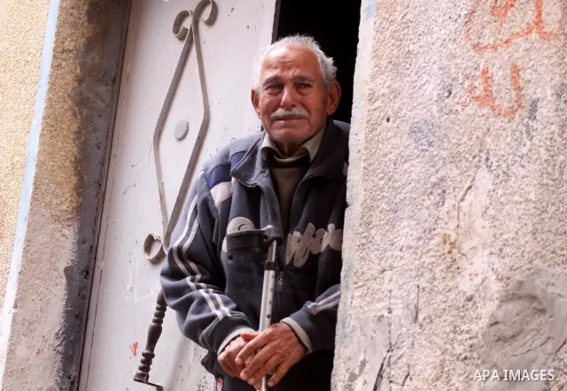 A Palestinian relative of Moamen abu Daff, who is known locally to be a fundamentalist Islamic Salafi militant, mourns during his funeral in Gaza City on December 30, 2011 after he was killed earlier in the day in an Isr...