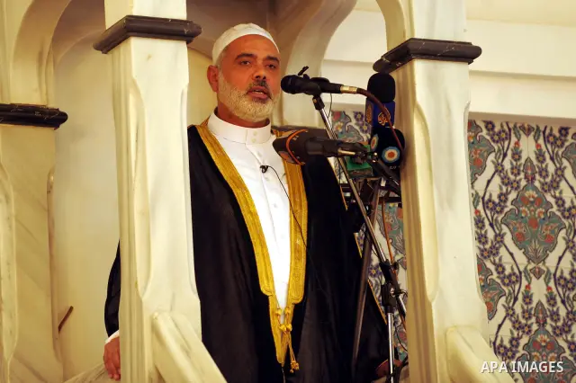 Palestinian prime minister in Gaza Strip, Ismail Haniyeh attends Friday prayers in Alnor in the Sudan's capital of Al-Khartoum on December 30, 2011. Photo by Mohamad Ostaz