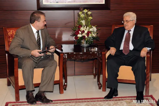 Palestinian President Mahmoud Abbas (Abu Mazen) receives Russian Ambassador Alexei Rudakov in the West Bank city of Ramallah on Dec 31, 2011. Photo by Mufeed Abu Hasna