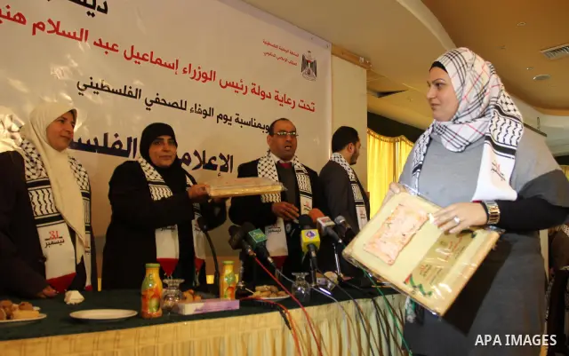 Palestinian government Information Office, honoring women journalists during a ceremony in Gaza City on Dec 31,2011. Photo by Mohammed Asad