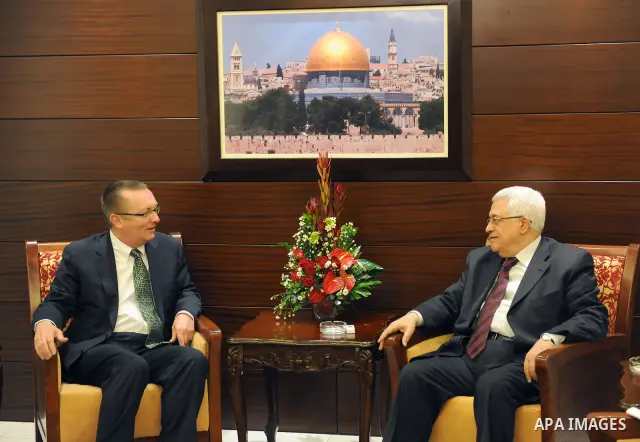 Palestinian President, Mahmoud Abbas (Abu Mazen), during a meeting with the Italian Consul General in Jerusalem, Luciano Bisota, in the West Bank city of Ramallah on Dec 26, 2011. Photo by Thaer Ghanaim