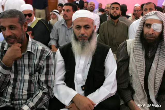 In this Oct. 26, 2011 file photograph, Zuhair al-Qaissi, a secretary-general of the armed wing of the Popular Resistance Committees (PRC) attends a celebration. An Israeli airstrike killed a top Palestinian militant comm...