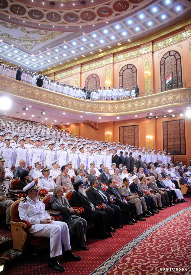 In this image released by the Egyptian Presidency, Egyptian President, Mohammed Morsi at a graduation ceremony at the Police Academy headquarters in Cairo, Egypt, July 14, 2012. The Police Academy was also the venue for...