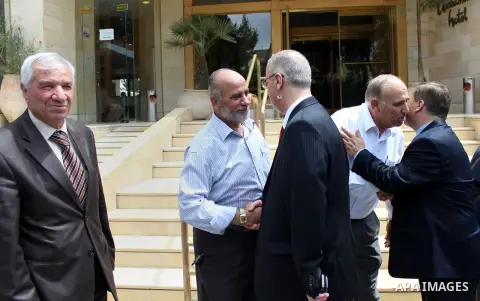 Newly appointed Palestinian Prime Minister Rami Hamdallah arrives at the Al-Makassed Islamic Charitable Society Hospital, in Jerusalem, June 16, 2013. Hamdallah said the PA is trying to build support for Jerusalem in Ara...