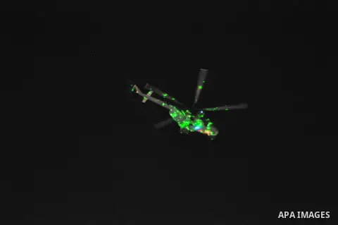 An Egyptian army 'Apache' helicopter flies over Tahrir square in Cairo, Egypt, 26 July 2013. Egyptian authorities on 26 July ordered ousted president Mohammed Morsi to be detained for 15 days pending further investigatio...