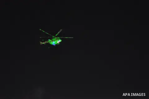An Egyptian army 'Apache' helicopter flies over Tahrir square in Cairo, Egypt, 26 July 2013. Egyptian authorities on 26 July ordered ousted president Mohammed Morsi to be detained for 15 days pending further investigatio...