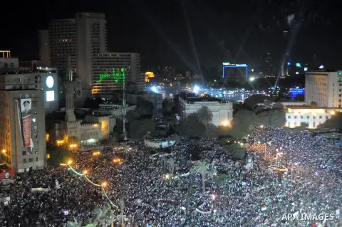 Egyptian opponents of ousted president Mohamed Morsi gather at Tahrir Square in Cairo, Egypt, 26 July 2013. Egyptian authorities on 26 July ordered ousted president Mohammed Morsi to be detained for 15 days pending furth...