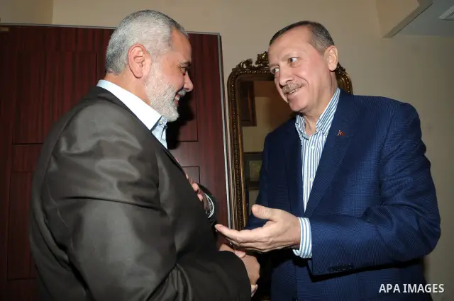 Palestinian Prime Minister of Gaza Ismail Haniya (L) shaking hands with Turkish Prime Minister Recep Tayyip Erdogan upon his arrival for a meeting in Istanbul on January 1, 2012. Haniya is a regional tour for the first t...