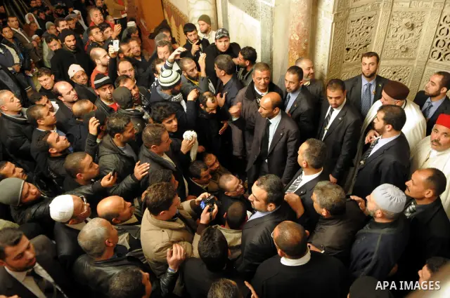 Palestinian prime minister in gaza Ismail Haniya prays as he visits the Zitouna mosque on January 6, 2012 in Tunis on the second day of a visit to Tunisia. The Hamas leader is in Tunisia as part of a six-country tour. He...