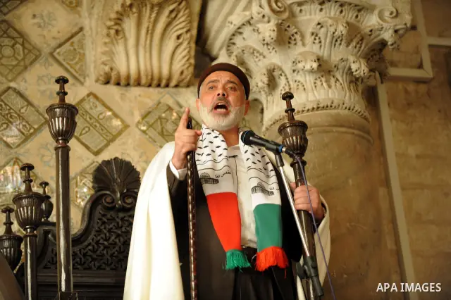 Palestinian prime minister in gaza Ismail Haniya prays as he visits the Zitouna mosque on January 6, 2012 in Tunis on the second day of a visit to Tunisia. The Hamas leader is in Tunisia as part of a six-country tour. He...