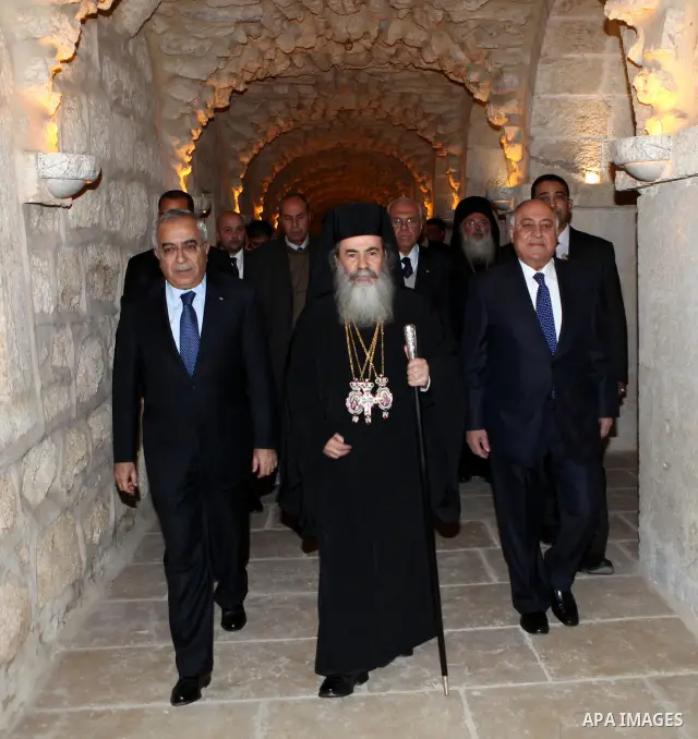 Palestinian Prime Minister Salam Fayyad Participate in the " Gala dinner" the Christmas procession inside the Church of the Nativity in the West Bank town of Bethlehem January 6, 2012. Photo by Mustafa Abu Dayeh
