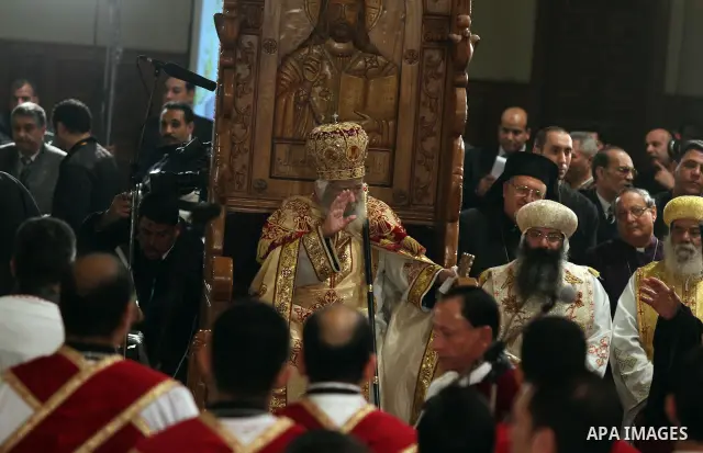 Pope Shenouda III, the 117th Pope of the Coptic Orthodox Church of Alexandria and Patriarch of the See of St. Mark Cathedral, leads the Coptic Christmas eve mass at the main cathedral in Cairo January 6, 2012. Egypt's Ch...