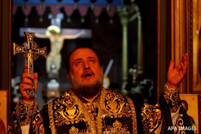 A Greek Orthodox priest attend Christmas services at the Saint Porfirios church in Gaza City January 7, 2012. Photo by Ashraf Amra