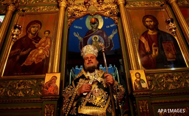 A Greek Orthodox priest attend Christmas services at the Saint Porfirios church in Gaza City January 7, 2012. Photo by Ashraf Amra