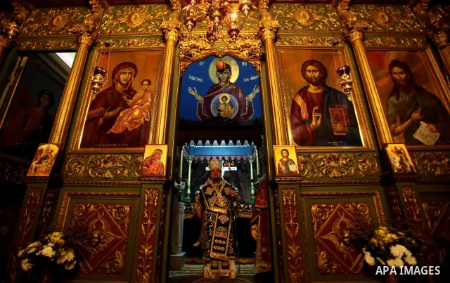 A Greek Orthodox priest attend Christmas services at the Saint Porfirios church in Gaza City January 7, 2012. Photo by Ashraf Amra