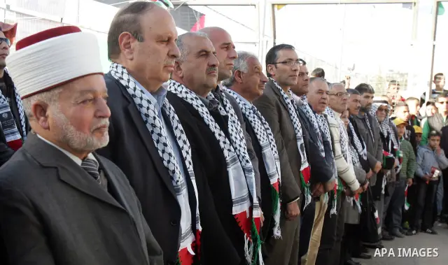Palestinian Supporters of Fatah movement during a celebration to mark the 47th anniversary of the Fatah political movement, in sour baher Village, in jerusalem, on Jan 07, 201. Photo by Mahfouz Abu Turk