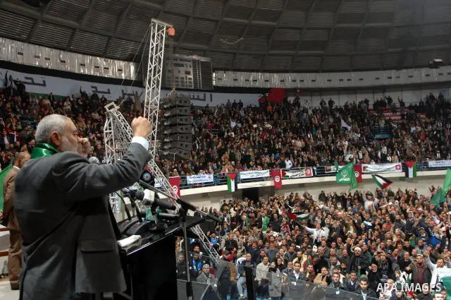 Ismail Haniya, prime minister in the Hamas-ruled Gaza Strip, gestures as he speaks in front of supporters of the Tunisian islamist Ennahdha Party on January 8, 2012 in Tunis. A visit by Gaza's Hamas leader has angered th...