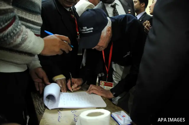 Jimmy Carter's at the Rod Farag School. During his presidency in the 1970s, Carter helped broker the Camp David Accords that led to a 1979 peace agreement between Israel and Egypt. -- Jimmy Carter's visit to the Committe...