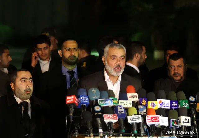 Palestinian Prime Minister in Gaza Strip, Ismail Haniyeh, speaks during press conference while his arrival at Rafah Crossing in the southern Gaza Strip January 10, 2012. Haniyeh returned to Gaza on Tuesday after making a...