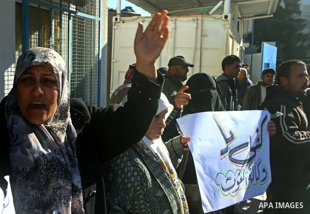 A Palestinians during a demonstration at an UNRWA (United Nations Relief and Works Agency for Palestine Refugees in the Near East) distribution center in Nusirat, central Gaza January 12, 2012. About 50 Palestinians gath...
