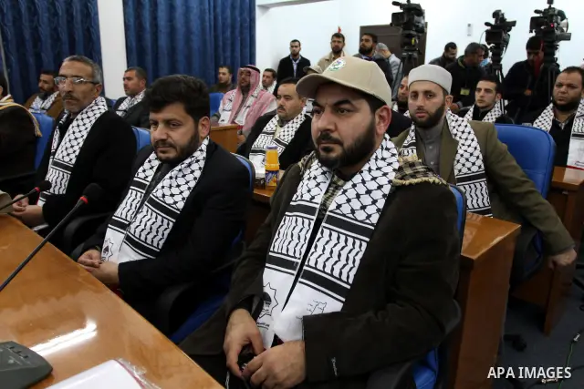 Palestinian Legislative Council members of the mass of change and reform during meeting convoy of "Miles of Smiles 8" at the parliament headquarters in Gaza city on Jan. 15, 2012. Photo by Mohammed Asad