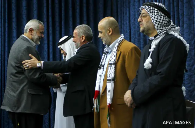 Palestinian Prime Minister in Gaza Strip, Ismail Haniyeh, receives convoy of "Miles of Smiles 8" in his office in Gaza City on Jan. 16, 2012. 16, 2012. Photo by Ashraf Amra