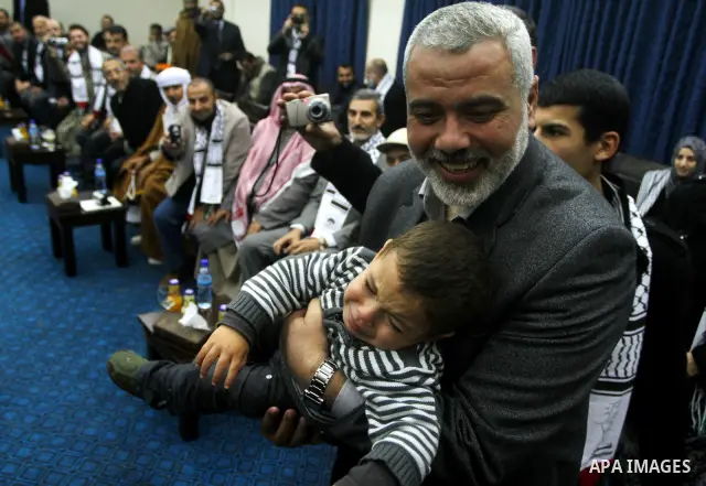 Palestinian Prime Minister in Gaza Strip, Ismail Haniyeh, receives convoy of "Miles of Smiles 8" in his office in Gaza City on Jan. 16, 2012. 16, 2012. Photo by Ashraf Amra