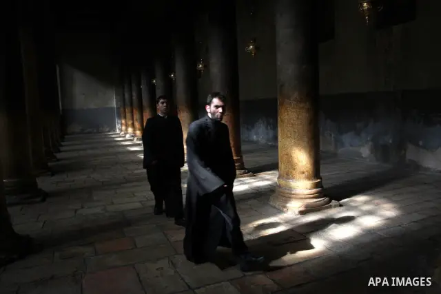 Christians celebrate during an Armenian Christmas procession through Manger Square to the Church of the Nativity in West Bank city of Bethlehem, Wednesday, Jan. 18, 2012. The Armenian Orthodox church in the Holy Land cel...