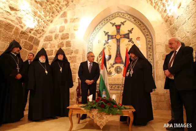 Palestinian prime minister Salam Fayyad, during an Armenian Christmas procession through Manger Square to the Church of the Nativity in West Bank city of Bethlehem, Wednesday, Jan. 18, 2012. The Armenian Orthodox church...