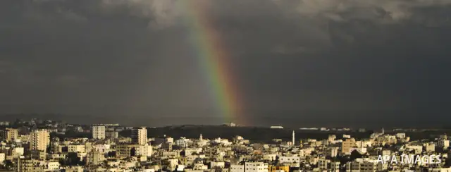 A rainbow appears over the northern Gaza Strip, on January 19, 2012. Photo by Ali Jadallah
