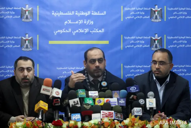 Palestinian Government spokesman, Taher Al Nono, and Hassan Abu Hashish, the chief of hamas media bureau speak during a press conference in Gaza City, on Jan. 21, 2012. Photo by Mohammed Asad