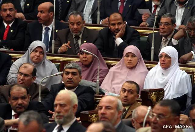 Egyptian parliament members attend the first parliament session after the revolution that ousted former President Hosni Mubarak, in Cairo January 23, 2012. Egypt's parliament began its first session on Monday since an el...