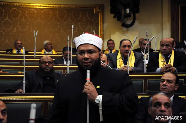 Egyptian parliament members attend the first parliament session after the revolution that ousted former President Hosni Mubarak, in Cairo January 23, 2012. Egypt's parliament began its first session on Monday since an el...