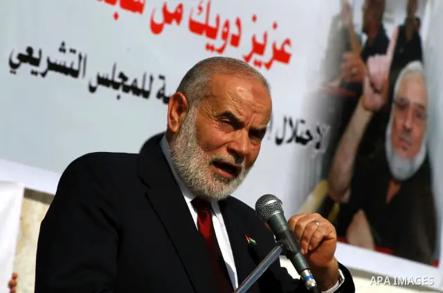 Palestinian Legislative Council members and other officials participate in a press conference during a protest in Gaza City on January 24, 2012 in solidarity with Palestinian parliamentary members, who were arrested by t...