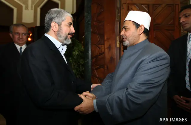 Senior Hamas leader Khaled Mashal meets with al-Azhar Sheikh, Ahmed al-Tiab in Cairo, Egypt on Jan. 24,2012. Photo by Mohammed al-Hams