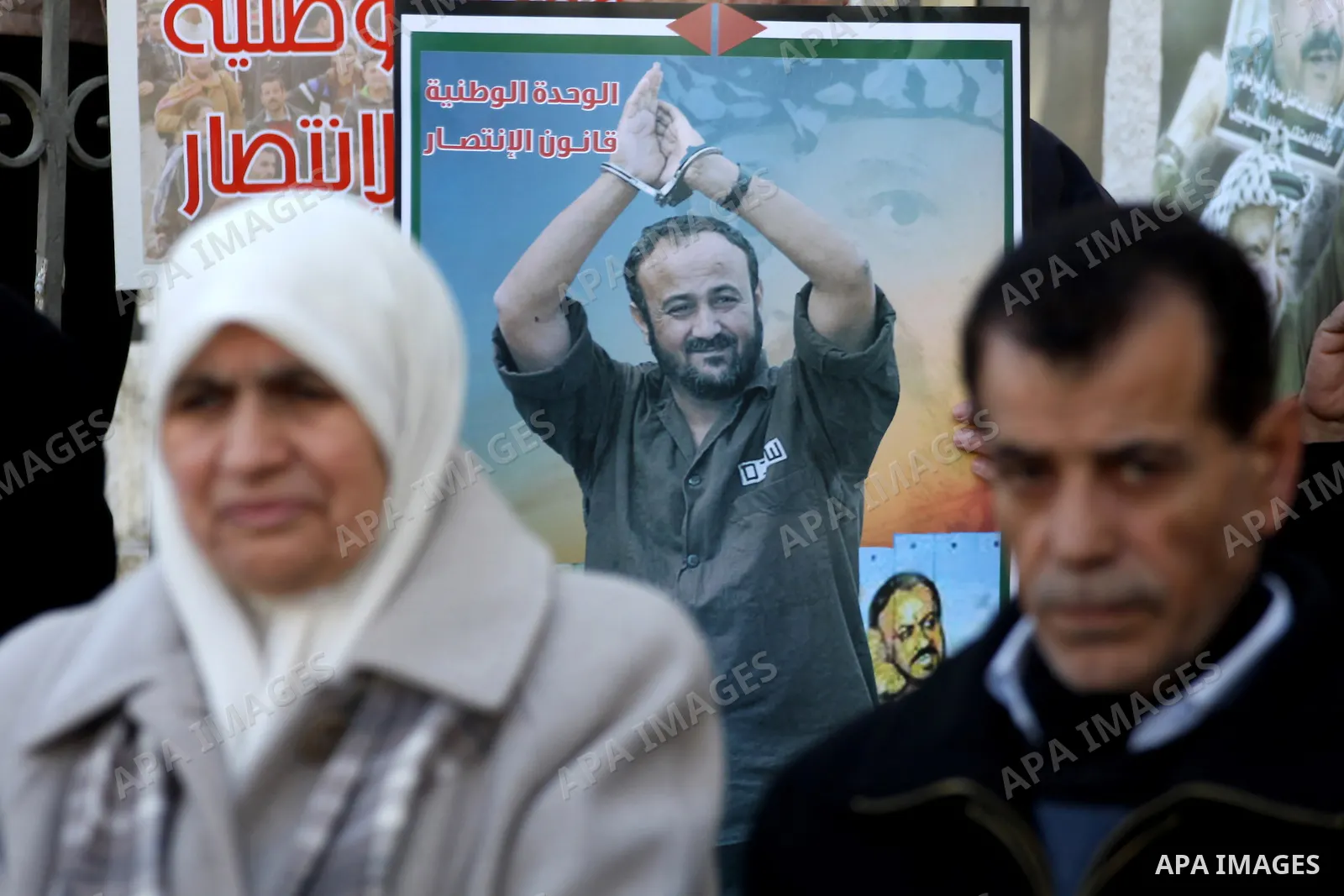 Relatives of Palestinian prisoners held in Israeli jails protest in front the International Committee of the Red Cross (ICRC) offices in the West Bank town of Ramallah, 24 January 2012, during a protest organized by the...