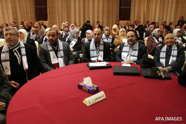 Palestinian Prime Minister in Gaza Strip, Ismail Haniya receives 40 dean of different of the universitys Arab countries during academic conference in Gaza city, on Jan. 24, 2012 . photo by Mohammed Asad