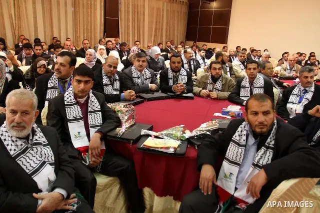 Palestinian Prime Minister in Gaza Strip, Ismail Haniya receives 40 dean of different of the universitys Arab countries during academic conference in Gaza city, on Jan. 24, 2012 . photo by Mohammed Asad