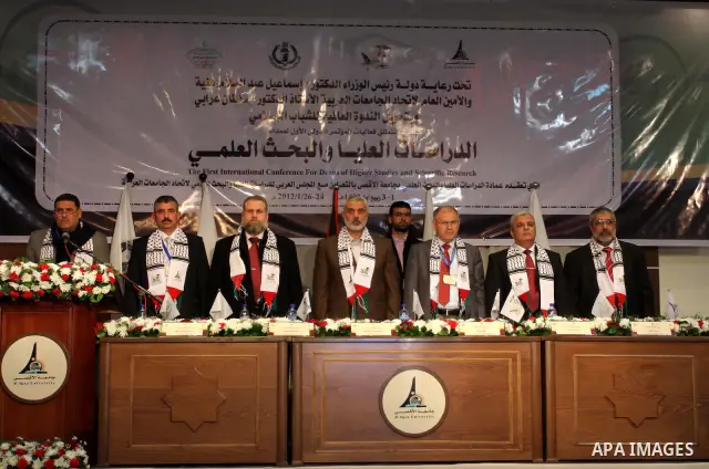 Palestinian Prime Minister in Gaza Strip, Ismail Haniya receives 40 dean of different of the universitys Arab countries during academic conference in Gaza city, on Jan. 24, 2012 . photo by Mohammed Asad