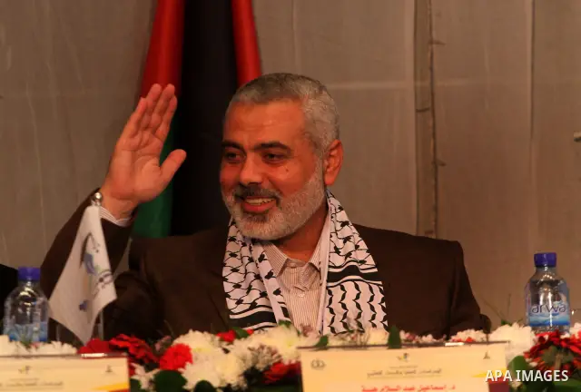 Palestinian Prime Minister in Gaza Strip, Ismail Haniya receives 40 dean of different of the universitys Arab countries during academic conference in Gaza city, on Jan. 24, 2012 . photo by Mohammed Asad