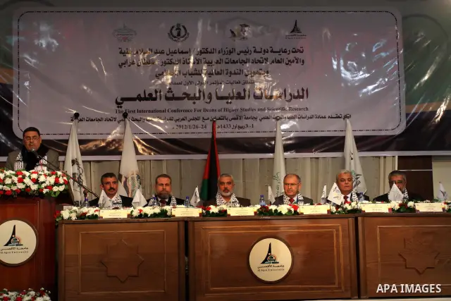 Palestinian Prime Minister in Gaza Strip, Ismail Haniya receives 40 dean of different of the universitys Arab countries during academic conference in Gaza city, on Jan. 24, 2012 . photo by Mohammed Asad